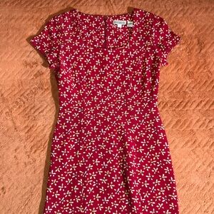 Women’s size 2 Ann Taylor dress. Red w/ pattern. Just past knee. Short sleeve.
